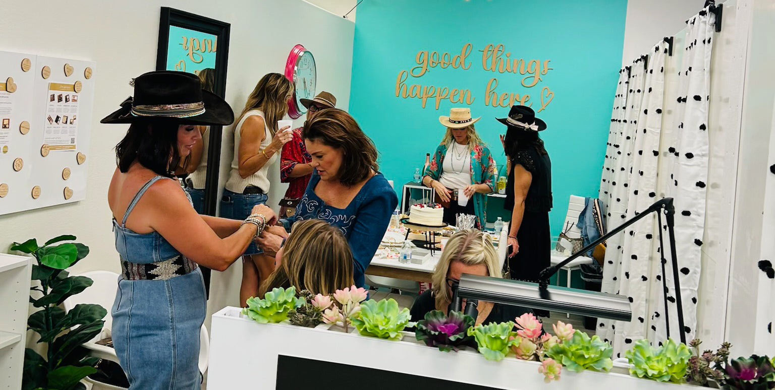Eight women in The Love, Georgie Lab, which is a space we offer in Phoenix to host your private jewelry or engraving party.